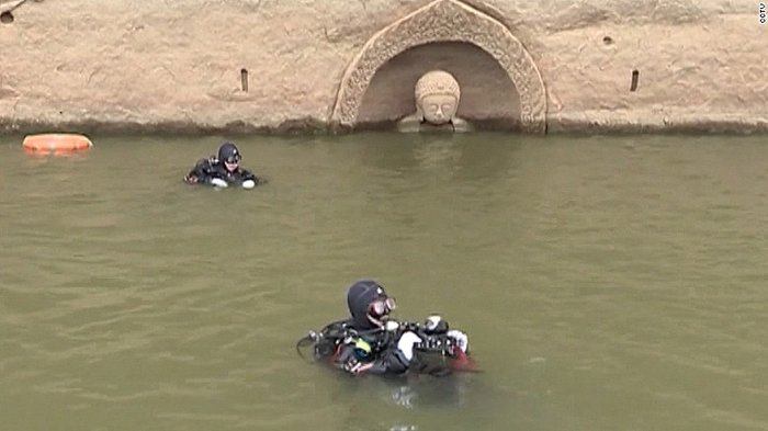 Sunken, 600-year-old Buddha emerges from water in China